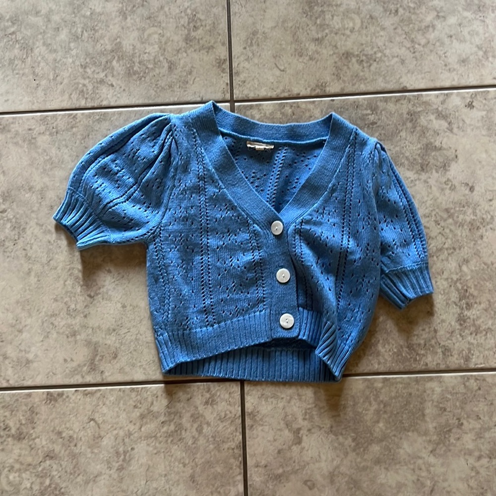 Women’s size small V-neck, short sleeve sweater vest